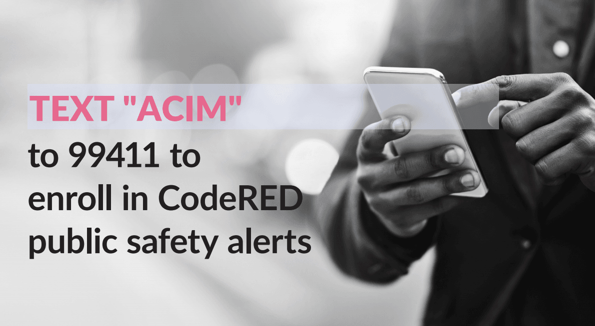 black and white photo of hands holding a smartphone.