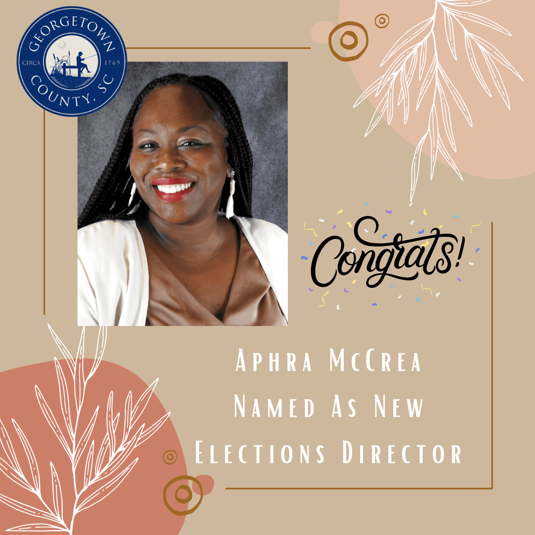 Portrait of Aphra McCrea on floral background.