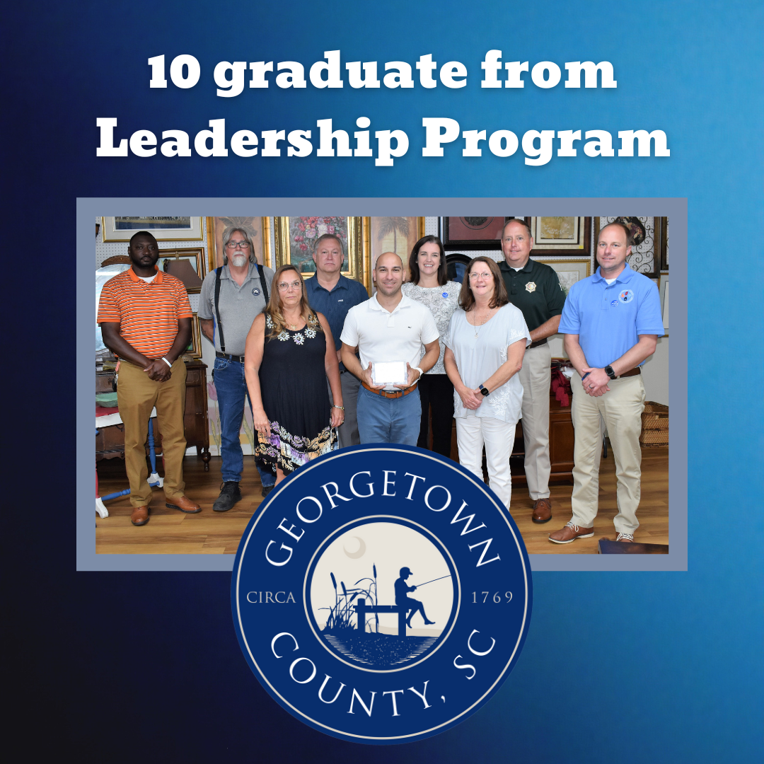 Photo of 9 program participants on blue background with county logo and article headline above