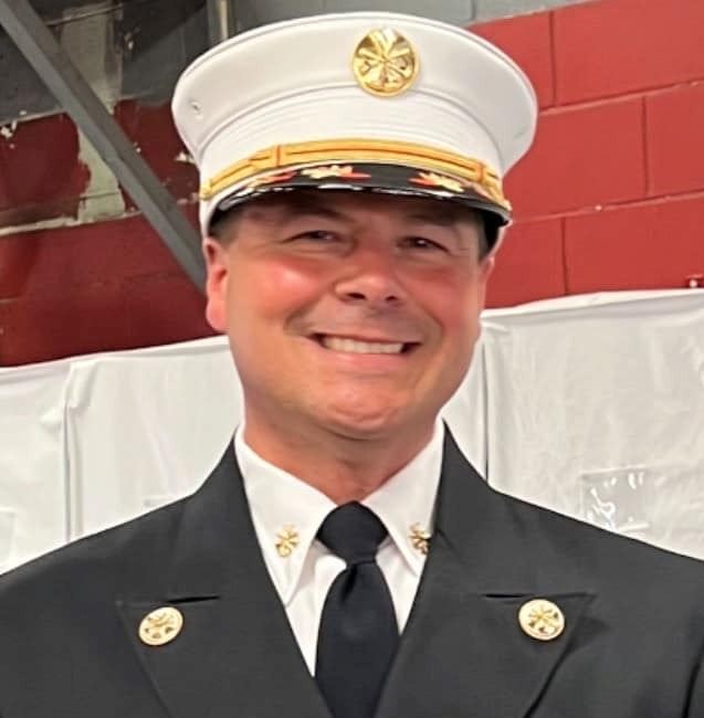A photograph of new Midway Fire chief Brent McClellan, wearing his dress uniform.