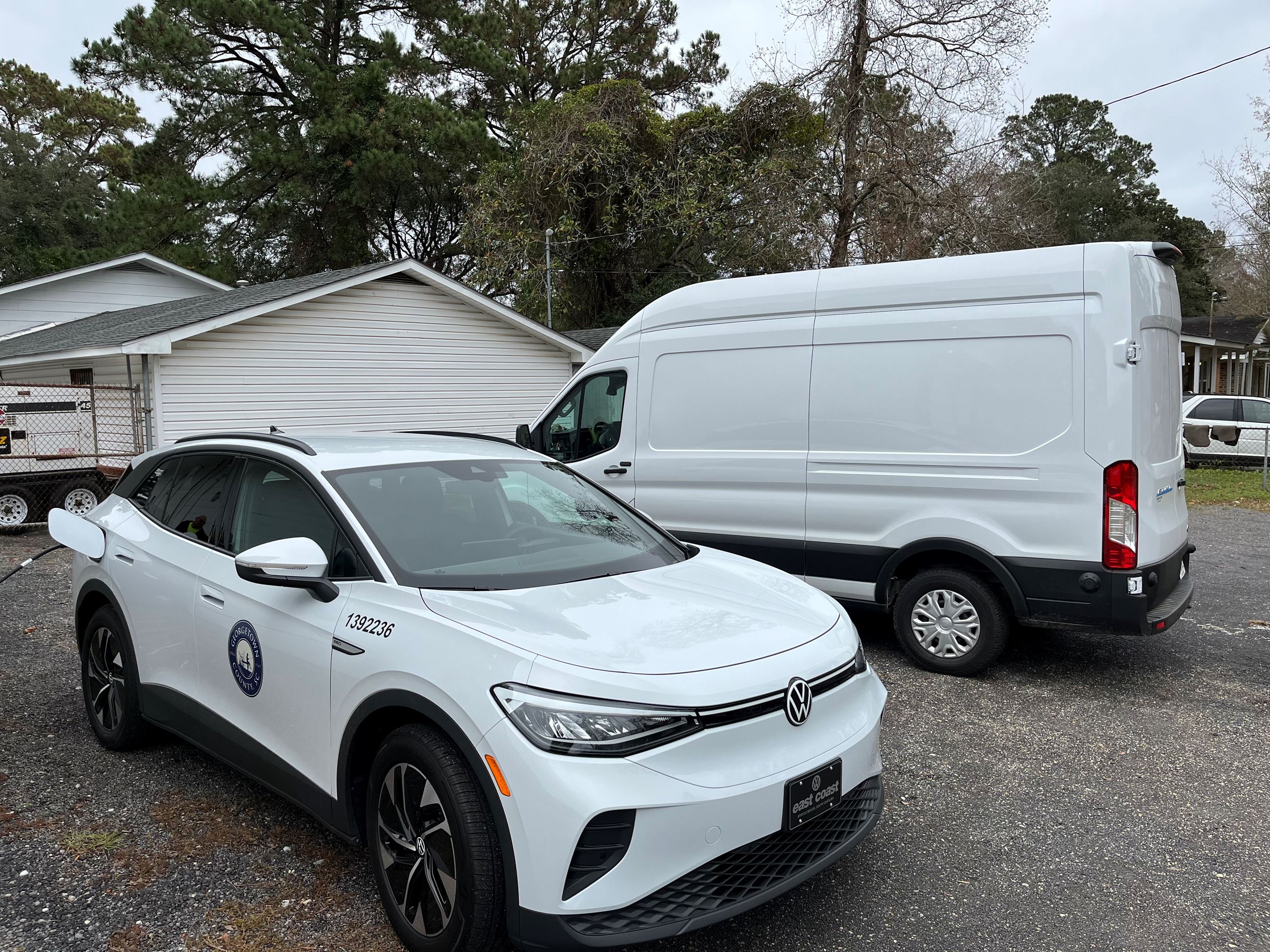 a Volkswagen Id.4 and a Ford Transit-350