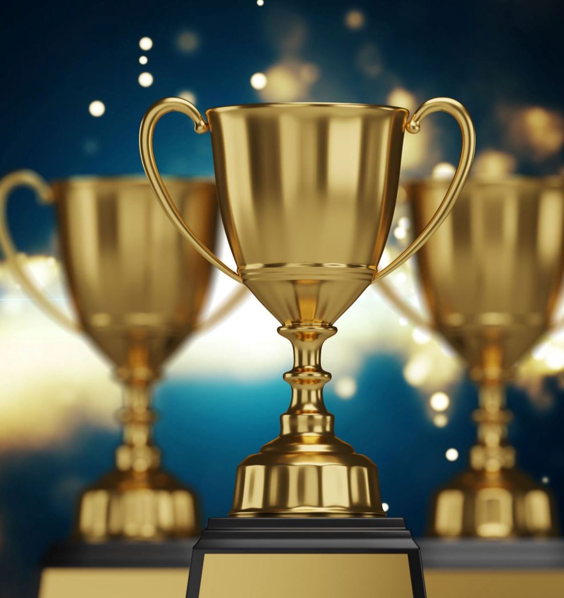 Photo of three gold trophies in a row