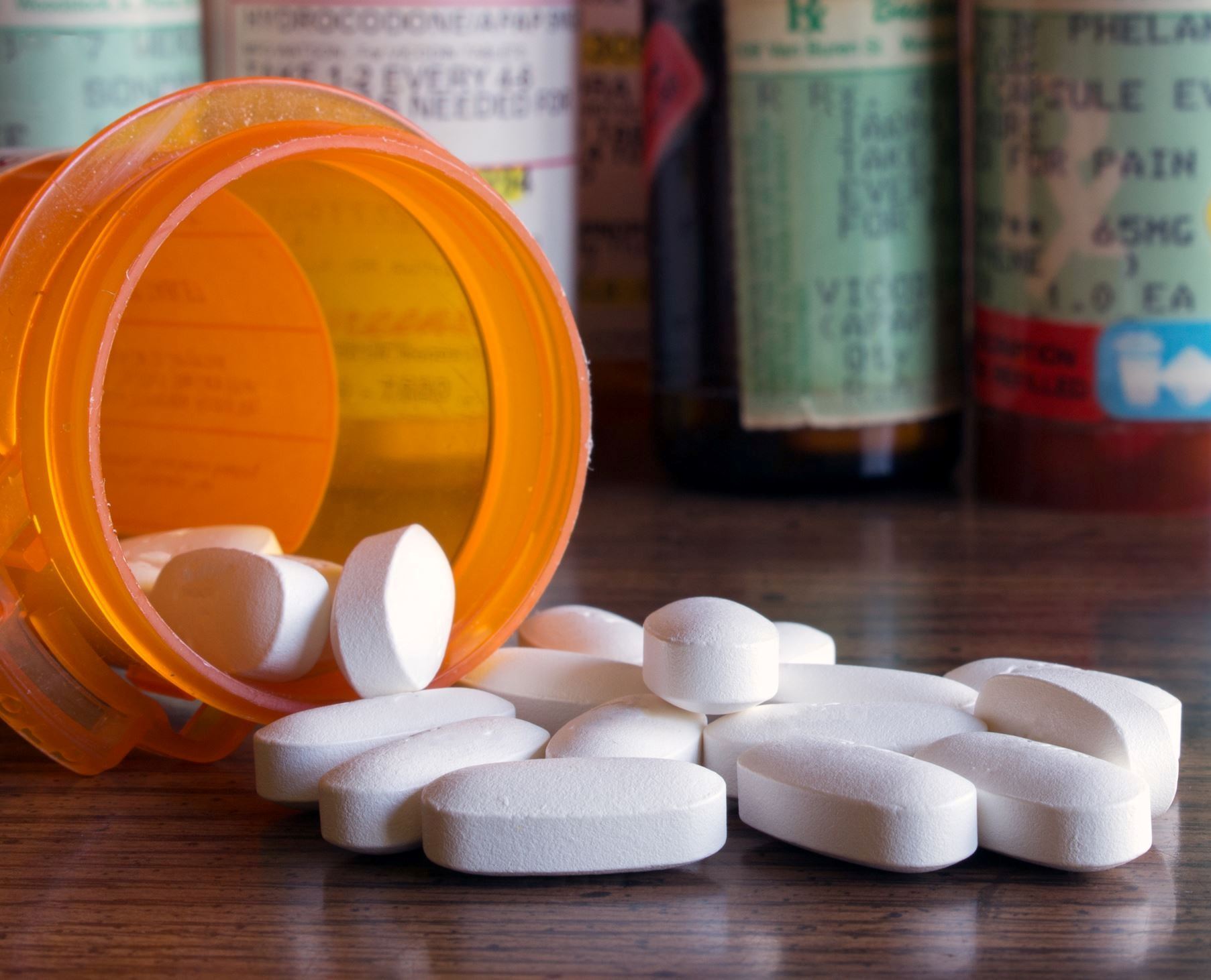 an open container of prescription pills