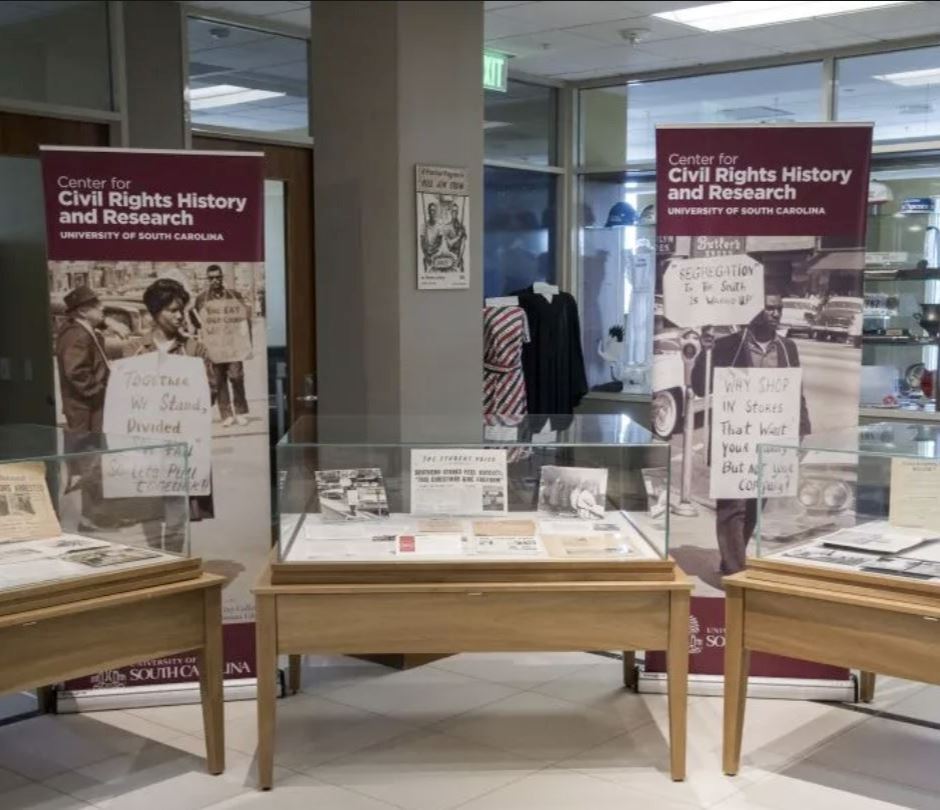 An image of tables, cases and displays set up as part of the exhibit