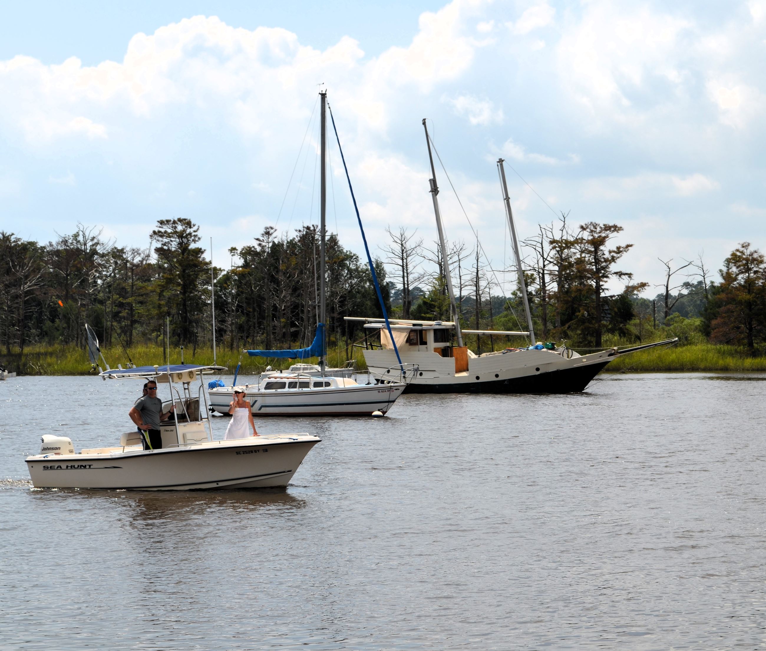 small and medium-size boats float along the Georgetown Harbor